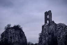 A view to the ruins of the castle on the rock in dramatic atmosphere near Klentnice, Czech republic