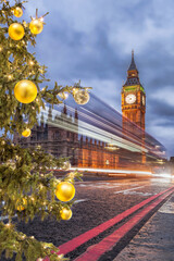 Fototapete - Big Ben with Christmas tree on bridge at night in London, England, United Kingdom