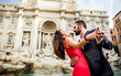 Couple spending romantic time at the trevi fountain