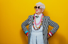 Funny Grandmother Portraits. Senior Old Woman Dressing Elegant For A Special Event. Granny Fashion Model On Colored Backgrounds