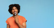 © Prostock-studio - Curious african american man with spoon in his mouth
