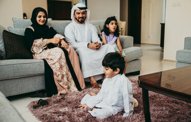 Wall Mural - Arabic happy family lifestyle moments at home