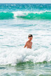 © Mikael - Boy playing in sea, close up, Alvor, Algarve, Portugal, Europe