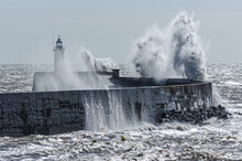 Huge Waves Crash Over The Harbour Wall At Newhaven, East Sussex United Kingdom UK