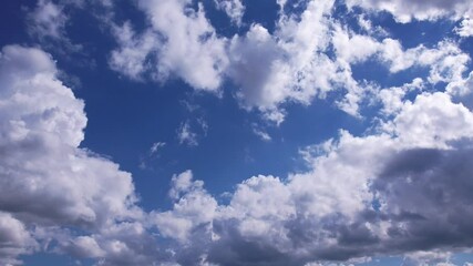 Wall Mural - 4k time lapse, blue sky white clouds, nature background, blue sky with clouds. sky clouds motion sce