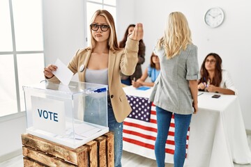 Poster - Group of young girls voting at democracy referendum doing italian gesture with hand and fingers confident expression