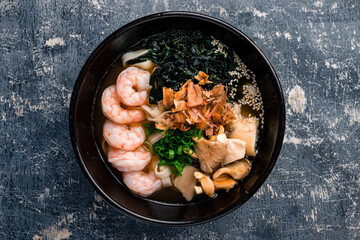 Canvas Print - Spicy asian Ramen noodles with Prawns on dark background