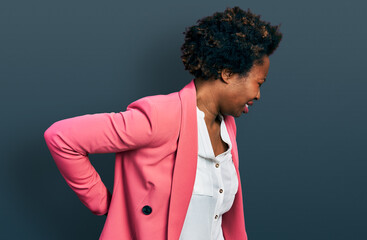 Sticker - African american woman with afro hair wearing business jacket suffering of backache, touching back with hand, muscular pain