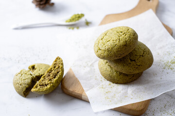 Matcha greentea cookies set on cafe table.