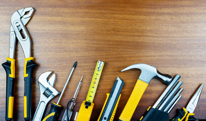 Tools for housework are displayed in a row