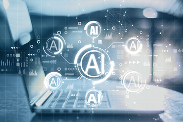 Fototapete - Close up of laptop computer with creative AI hologram on blurry background. Artificial intelligence, ai, technology and communication concept. Double exposure.