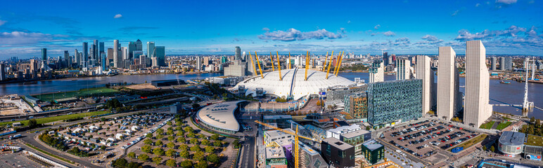 Fototapete - Aerial bird's eye view of the iconic O2 Arena near isle of Dogs and Emirates Air Line cable car in London, United Kingdom