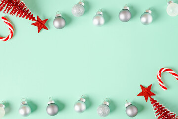 Poster - top view christmas ornament xmas tree,candy cane,bauble decor on pastel green background