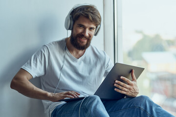 Wall Mural - bearded man with laptop entertainment Lifestyle