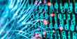 © Westend61 - Fiber optics carrying computer virus attacking binary code