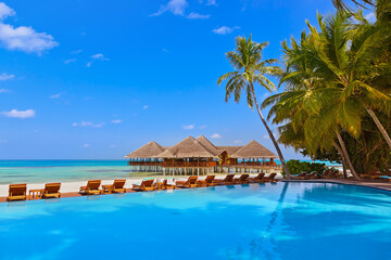 Wall Mural - Pool and cafe on Maldives beach