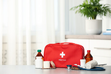 Wall Mural - First aid kit on table indoors, space for text