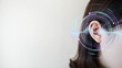 Ear of young woman with sound waves simulation technology. Concept of hearing test, hearing aids, ear disorders and health care.