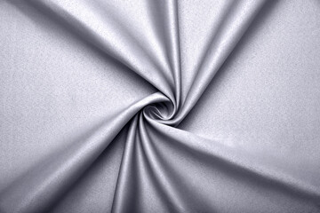 Background, texture. Template. Satin cloth for wedding and evening dresses. A nude shade.