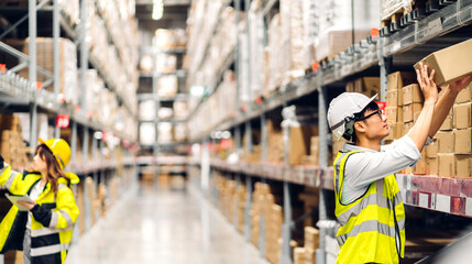 Wall Mural - Portrait of smiling asian engineer man order details checking goods and supplies on shelves with goods background in warehouse.logistic and business export