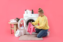 Concept Of Housework With Washing Machine And Girl On Pink Background