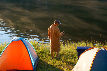 Poster - person in tent