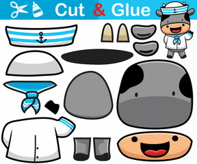 Wall Mural - Vector illustration of funny cow cartoon in sailor costume. Cutout and gluing