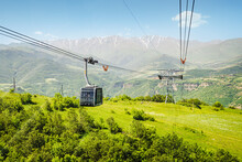 A Cable Car And Funicular In Summer Transports Passengers And Tourists Up The Hill In The City Or In A Nature Park.