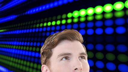 Poster - Animation of eyes of inquisitive man over glowing green and blue lights of server processing data