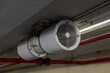 © kanpisut - Fan in modern building Parking in door. Parking building ventilation system. blower flow air for confined space work in factory. Industrial Fan Heater and Cooler.