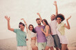 © deagreez - Portrait of attractive carefree cheerful people buddy fellow meeting having fun chill at beach outdoors