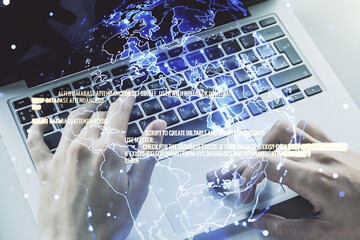 Poster - Abstract creative coding concept with world map and hands typing on laptop on background. Multiexposure