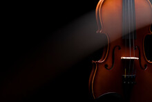 A Streak Of Light Cutting Through A Violin Or Viola On A Black Background