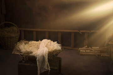 Empty crib in nativity manger