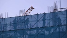 Migrant Farmers Working On Construction Of Residential Building,Beijing,China.