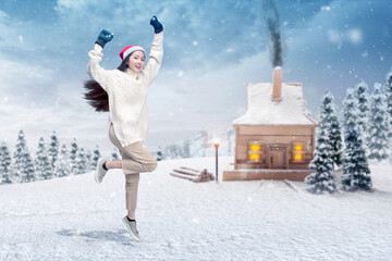 Canvas Print - Asian woman with winter gloves and Santa hat standing