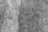 Fototapeta  - Stare szare tło powierzchni ściany po spoinowaniu kleju szpachlowego z teksturą pęknięć.