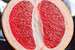 Half a grapefruit as an erotic concept. Symbolic image of the vagina of the hymen. Close-up. Selective focus