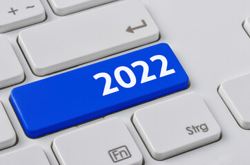Wall Mural - a keyboard with a blue button - 2022