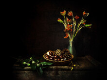 Autumn Still Life With Conkers, Stinking Iris Seeds, Acorns And Pine Cones. Chiaroscuro Style.