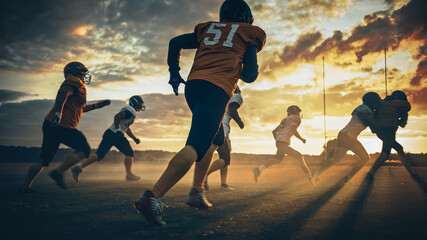 American Football Field Two Teams Compete: Players Pass and Run Attacking to Score Touchdown Points. Professional Athletes Fight for the Ball, Tackle. Golden Hour Sunset Shot