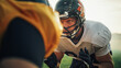 © Gorodenkoff - American Football Game Start Teams Ready: Close-up Portrait of Two Professional Players, Aggressive Face-off. Competition Full of Brutal Energy, Power, Skill. Dramatic Stare.