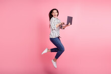 Full Body Profile Side Photo Of Excited Girl Jump Use Laptop Agent Manager Isolated Over Pink Color Background
