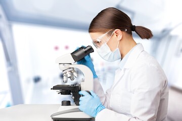 Wall Mural - Serious concentrated young medical scientist, pharma chemist, biotech company employee, lab assistant