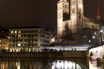 Wall Mural - Old town of Zürich at autumn night with river Limmat and protestant church Great Minster. Photo taken November 20th, 2021, Zurich, Switzerland.