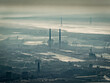 vue aérienne du port du Havre dans la brume et de la centrale thermique