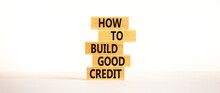 Build Good Credit Symbol. Wooden Blocks With Words How To Build Good Credit. Beautiful White Background, Copy Space. Business And Build Good Credit Concept.