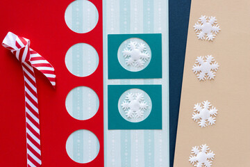  paper background with christmas elements (snowflakes and ribbon)