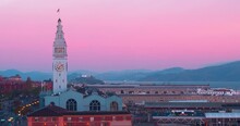 Aerial of San Francisco Ferry Building & Embarcadero at sunrise