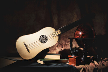 Musical still life in the Renaissance style with renaissance guitar